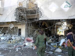 Fighters with the Saudi-backed coalition assess the damage inside the airport of Yemen's southern city of Aden on December 31, 2020, a day after explosions rocked the building, killing or injuring dozens of people.  Saleh Al-OBEIDI / AFP