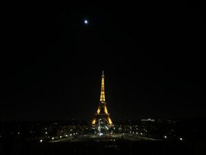 This picture shows the illuminated eiffel tower during the New Year's Eve as a 8:00 pm-6:00 am curfew is implemented in France to avoid a third wave of Covid-19 infections, in Paris, on January 1, 2021. There is still a nationwide overnight curfew from 8:00 pm to halt the spread of the virus while restaurants and cafes as well as theatres and cinemas remain closed. Stefano RELLANDINI / AFP