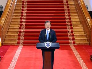 South Korea's President Moon Jae-in delivers his New Year's address at the presidential Blue House in Seoul on January 11, 2021. YONHAP / AFP