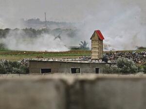 A picture taken on January 13, 2021 shows smoke rising at the scene of an Israeli attack on a Hamas position near the Palestinilan city of Khan Yunis in the southern Gaza Strip. The Israeli army fired artillery at Hamas targets in Gaza in response to what it described as gunfire from within Gaza on an "engineering vehicle" operating near the border.SAID KHATIB / AFP