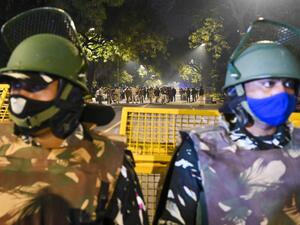 Police cordon off an area at a street after an explosion near the Israeli embassy in New Delhi on January 29, 2021. Sajjad HUSSAIN / AFP