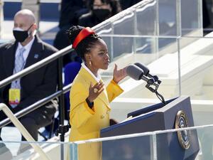 Poet Amanda Gorman speaks during the inauguration ceremony on the West Front of the U.S. Capitol on January 20, 2021 in Washington, DC. During today's inauguration ceremony Joe Biden becomes the 46th president of the United States. Kevin Dietsch-Pool/Getty Images/AFP