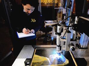 An outstanding close up of Vermeer's 'Girl with a Pearl Earring' through the lens of a Hirox 3D microscope (Twitter)