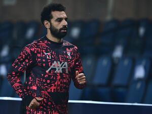 The Brazilian is adamant that his team-mate remains in good spirits at Anfield despite speculation over his future (Photo: AFP)