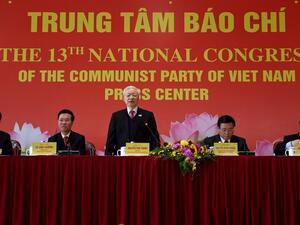 Vietnam's newly elected Communist Party general secretary Nguyen Phu Trong (C) takes part in a press conference after the closing ceremony of the Communist Party of Vietnam (CPV) 13th National Congress at the National Convention Centre in Hanoi on February 1, 2021. Nhac NGUYEN / AFP