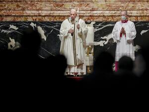 Pope Francis (C), assisted by Master of Pontifical Liturgical Ceremonies, Italian priest Guido Marini (R), celebrates mass on the occasion of the celebration of the World Day of Consecrated Life at St. Peter's Basilica in the Vatican on February 2, 2021. Andrew Medichini / POOL / AFP