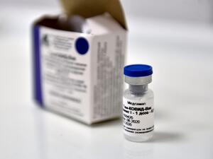 In this file photo taken on September 10, 2020 a vial with Russia's new coronavirus vaccine is seen prior to a vaccination of a volunteer in a post-registration trial, Moscow. Mexico authorized Russia's Sputnik V virus vaccine, the government informed on February 2, 2021. Natalia KOLESNIKOVA / AFP