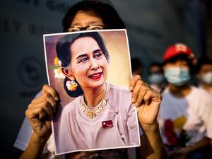 A protester holds a photo of detained Myanmar civilian leader Aung San Suu Kyi during a demonstration against the military coup outside the Myanmar Embassy in Bangkok on February 7, 2021. Jack TAYLOR / AFP