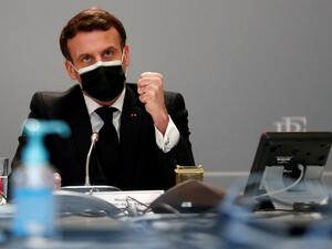 French President Emmanuel Macron delivrs initial remarks during the Act-A visionconference meeting at the Elysee Palace in Paris, on February 12, 2021. The Act-A launched by the World Health Organization is the initiative to coordinate a global response to the Covid-19 pandemic. Ian LANGSDON / POOL / AFP