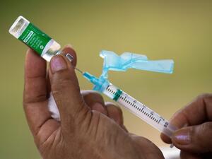  In this file photo taken on February 9, 2021 nurse Janete Da Silva Oliveira prepares a dose of Oxford-AstraZeneca COVID-19 vaccine in the Nossa Senhora Livramento community on the banks of the Rio Negro near Manaus, Amazonas State, Brazil. The vaccination campaign against COVID-19 that began a month ago in Brazil has been hampered by the lack of available doses and a cacophony due to the lack of national coordination from the Bolsonaro government. The mayor of Rio de Janeiro, Eduardo Paes, said on February