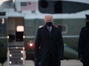 US President Joe Biden makes his way to board Air Force One prior to departure from Joint Base Andrews in Maryland, February 16, 2021, as he travels to Milwaukee, Wisconsin, for a town hall. SAUL LOEB / AFP