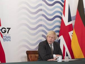 Britain's Prime Minister Boris Johnson hosts a virtual meeting of G7 leaders in the Cabinet Room at Downing Street in London on February 19, 2021. Johnson urged global leaders to move as one in ensuring coronavirus vaccines reach everyone around the world, including the poor. Geoff Pugh / POOL / AFP