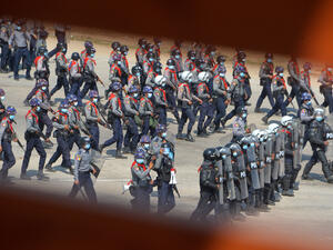 Police prepare to disperse protesters taking part in a demonstration against the military coup in Naypyidaw on February 22, 2021. STR / AFP