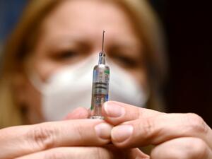 A nurse prepares a dose of the Covid-19 vaccine developed by China's Sinopharm company, at a vaccination center of a seniors club in Budapest on February 25, 2021, amid the ongoing coronavirus Covid-19 pandemic. Hungary on February 24, 2021 became the first EU nation to start using China's coronavirus Sinopharm vaccine, Prime Minister Viktor Orban said. The country of 10 million has ordered around five million doses of the Chinese jab, and has already started inoculating its population with Russia's Sputnik