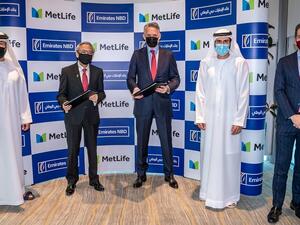 بنك الإمارات دبي الوطني يوقع اتفاقية شراكة استراتيجية مع متلايف  لتقديم حلول ومنتجات التأمين لعملائه