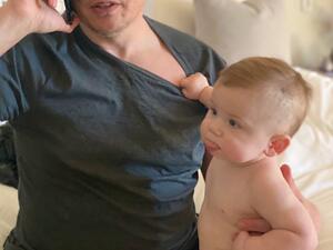 Elon Musk with his 9-month-old son, X Æ A-XII (Twitter)