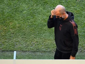The manager is worried that allowing players to travel around the world will increase risk of coronavirus spreading at clubs (Photo: AFP)