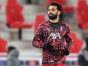 The former Reds midfielder believes the Egyptian frontman does not get the “love” he deserves for a remarkable record in English football (Photo: AFP)