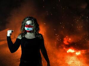 A Lebanese protester in a mask! 