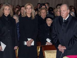 Princess Elena of Spain (L) and her sister Princess Cristina of Spain (C) stand with their father former king Juan Carlos 