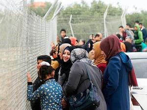 Palestinian women watching football 