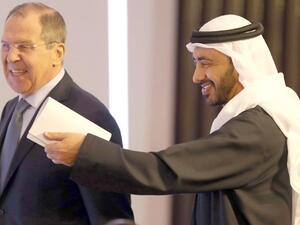 Lavrov (L), Abdullah bin Zayed al-Nahyan