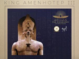 A statue of King Amenhotep III, his wife queen Tiye at the Egyptian Museum.