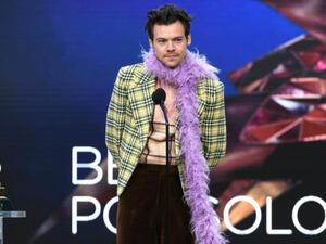 The 'Adore You' singer has donned retro, colourful outfits The 'Adore You' singer has donned retro, colourful outfits