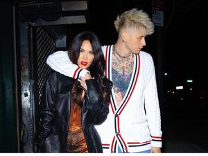  Megan Fox Looks Cozy Next To Punk Rock Beau Machine Gun Kelly as They Attend the UFC 260 Event in Las Vegas
