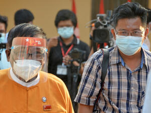 Aung Thura (R) before his abduction