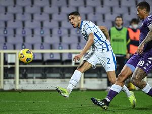 The Inter wing-back has been linked with a move to the Emirates this summer and has a big fan in the former Gunners defender (Photo: AFP)