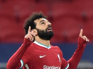 The Reds have booked a quarter-final spot in the Champions League, but their Egyptian forward admits domestic efforts in 2020-21 have been “tough” (Photo: AFP)