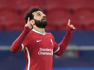 The Egyptian forward remains noncommittal about his status with the Reds (Photo: AFP)