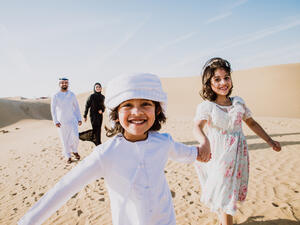 A happy family on a desert picnic