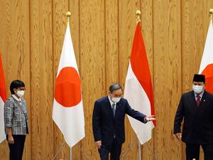 Prime Minister Yoshihide Suga urged to resign as new Japanese poll show