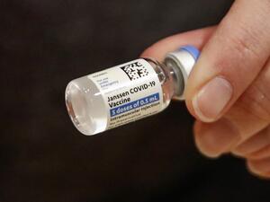 Nurse Florisa N. Lingad holds a Johnson & Johnson Janssen Covid-19 vaccine at a vaccination center established at the Hilton Chicago O'Hare Airport Hotel in Chicago, Illinois.