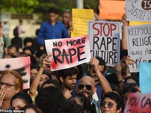 Girls, 14 and 15, are dragged to a forest and gang-raped