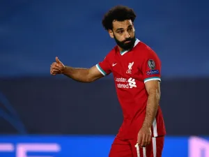 The Reds got back to winning ways on home soil when edging out Aston Villa 2-1, with their Egyptian forward on target once again (Photo: AFP)