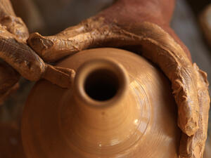 Close-up pictures of the traditional pottery making in the old way