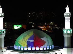 The Omar Ibn Al-Khattab Mosque in Foz do Iguacu, Parana State, Brazil, is seen illuminated with the flags of Brazil and Palestine, calling to an end to the escalated violence between Israel and Palestinian Territorie
