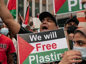 Protesters demanding an end to Israeli aggression against Palestine rally in Midtown Manhattan on May 11, 2021 in New York City. Recent violence between the Israeli military and Palestinians in Jerusalem has left dozens dead as activists around the world denounce attacks on the city's Al-Aqsa Mosque