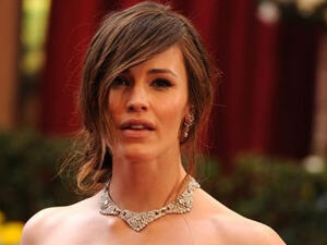 Jennifer is happy to let her children experiment with her makeup 