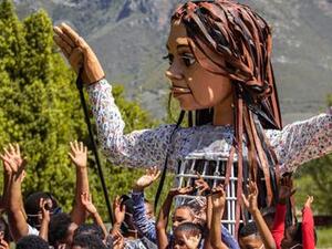  puppet of a fictitious Syrian girl named Amal