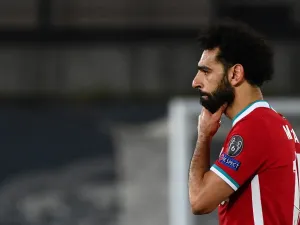 The Merseyside club's former goalkeeper thinks the Egyptian is holding back the potential of Jurgen Klopp's squad (Photo: AFP)