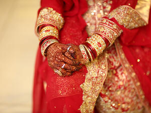Indian bridal showing wedding rings and bracelet jewelry