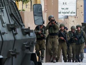 Israeli soldiers walk during a search operation in the village of Salem, east of Nablus, on June 3, 2021, following a reported shooting attack at an Israeli driver near the Allon Moreh settlement, in the occupied West Bank