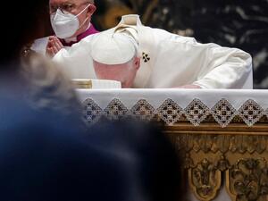 Pope Francis kisses the altar as he leads a Holy Mass on the Solemnity of the Most Holy Body and Blood of Christ in Saint Peter's Basilica at the Vatican City