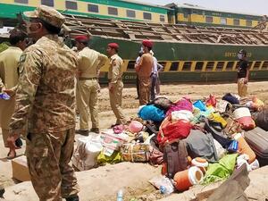 collision between two passenger trains in southern Pakistan kill 35 people.