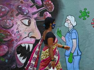 India recorded less than 100,000 new coronavirus cases Tuesday