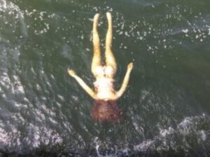 The doll was floating upside down on the water, leading passersby to alert the emergency services